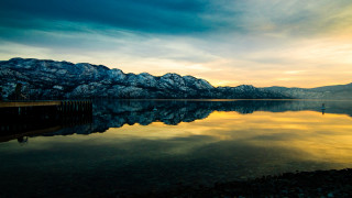 Lake mountains person dock bird - the background and a person free wallpaper for desktop