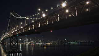 Bridge water night lights city 16 - a bridge over a body of water free wallpaper for desktop