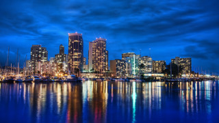 City skyline harbor boats night 3 - free city wallpaper