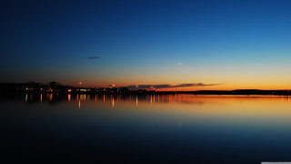Lake city night full moon - a city in the distance free wallpaper