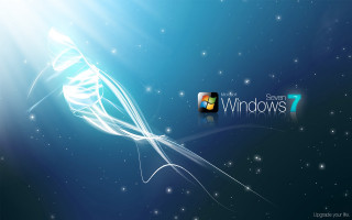 Blue white swirls windows7 star - sky behind free wallpaper