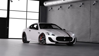 White masera parked garage wall - a garage next free wallpaper
