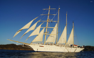 Large white sailboat sailing water - magical realism free wallpaper