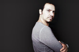 Serious man arm neck dark - ahmed karahisari free wallpaper