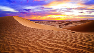 Sunset desert dunes clouds blue - a sunset over a desert free wallpaper