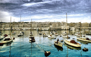 Harbor boats cloudy sky buildings - a rope free wallpaper
