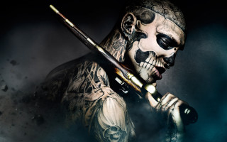 Man skull face paintbrush knife 2 - his hand and a knife free wallpaper