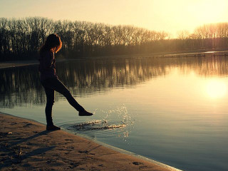 Woman beach water sunset sunrise - river free wallpaper
