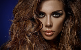 Woman long hair serious look 2 - her face and shoulders free wallpaper