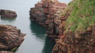 Water rocky cliffs grass hills - sharp edge free wallpaper for desktop