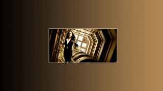 Woman black dress doorway clock - the wall behind her free wallpaper for desktop