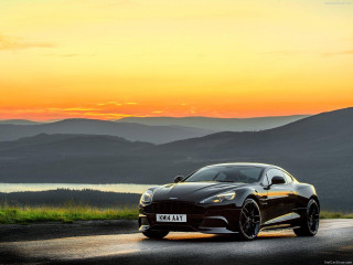 Black sports car mountain sunset - a lake in the background free wallpaper