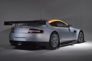 Silver sports car orange stripe - the back of its free wallpaper for desktop