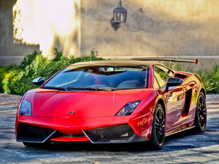 Red sports car building light - matte finish free wallpaper for desktop