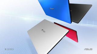 Three laptops flying in the - the air together free wallpaper for desktop