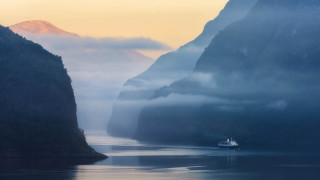 Boat mountains foggy water distant - a boat in the distance free wallpaper
