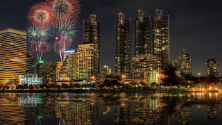 City skyline fireworks lake reflection - city background free wallpaper