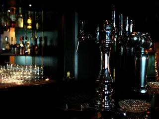 Bar liquor bottles silver candelabra - a bar free wallpaper