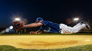 Baseball player diving night field - a baseball player free wallpaper