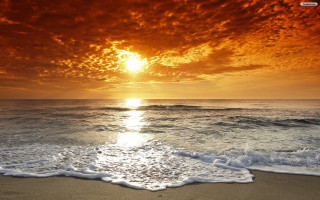 Sunset ocean waves red sky 4 - a sunset over the ocean free wallpaper
