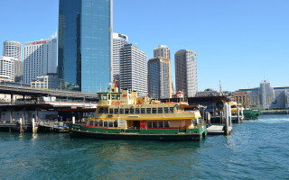 Ferry boat docked water city 2 - the water near a city skyline free wallpaper