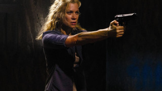 Woman holding gun dark room 2 - carey morris free wallpaper