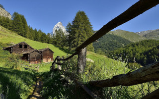 Wooden cabin green valley mountain - a grassy area free wallpaper