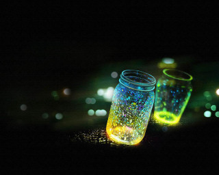 Jars colored lights dark bokeh - a table top free wallpaper