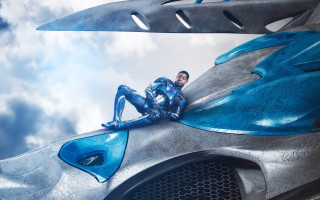 Futuristic man suit sitting car - abidin dino free wallpaper