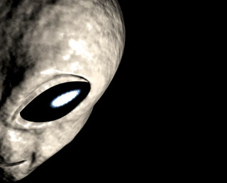 Alien blue eyes black background - alien free wallpaper