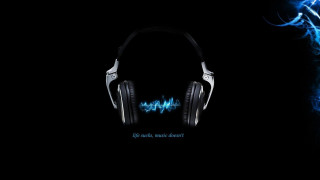 Headphones blue light dark background - a pair of headphones free wallpaper