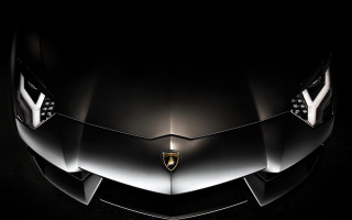 Shiny silver sportscar night sky - black background free wallpaper for desktop