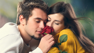 Man woman kissing holding rose 6 - a rose free wallpaper