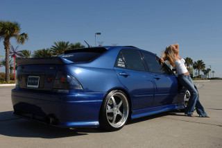 Woman blue car parking lot - the back free wallpaper for desktop