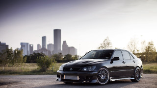 Black car parking lot city 3 - a parking lot free wallpaper