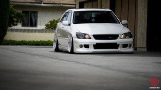 White car parked house red - end free wallpaper