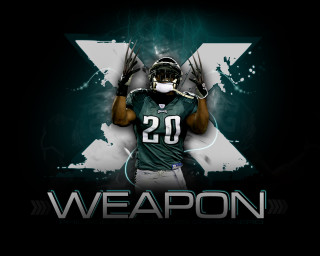 Football player 20 black background - a football player holding free wallpaper