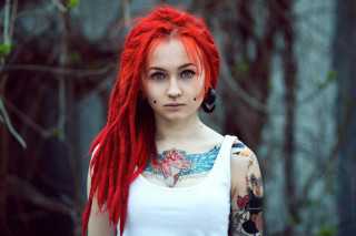 Woman red hair piercings forest - behind her free wallpaper