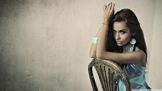 Woman blue dress leaning chair - a blue dress free wallpaper