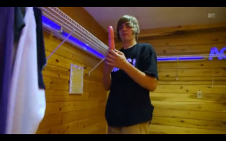 Man holding racket wood walls - cam sykes free wallpaper