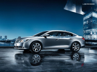 Silver car tall building night - a tall building free wallpaper for desktop