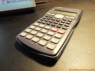 Calculator laptop table black surface - free technology wallpaper