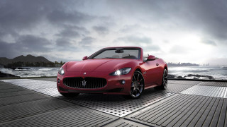 Red maserati dock ocean cloudy - the ocean under a cloudy sky free wallpaper