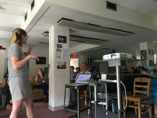 Woman crowd room laptop table - academic art free wallpaper