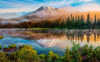 Mountain lake trees foggy sky - a foggy sky free wallpaper
