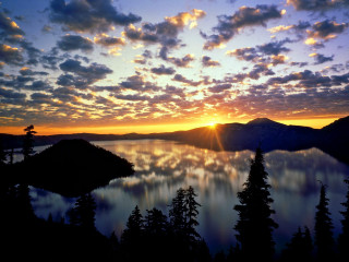 Sunset lake trees mountains clouds - a sunset over a lake free wallpaper for desktop
