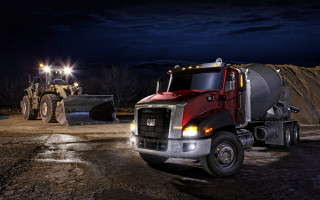 Large truck dirt lot night - a large truck free wallpaper