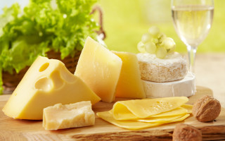 Cheese board with cheese and - cheese free wallpaper