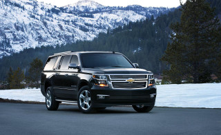 Black suv mountain snow trees - a black suv free wallpaper