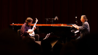 Two people piano microphone stand - a microphone and a microphone stand free wallpaper